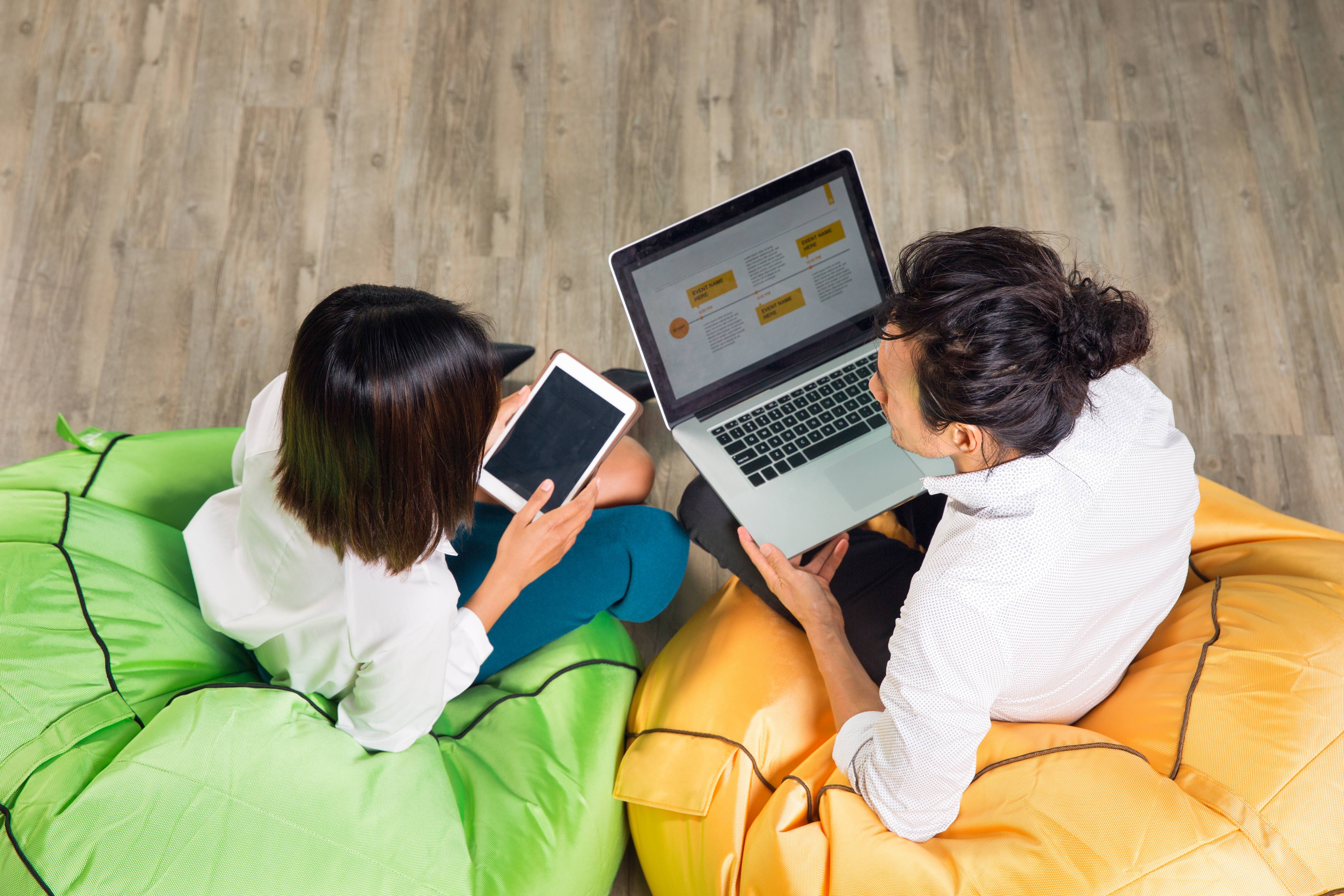 asian-man-woman-working-laptop-tablet (1)