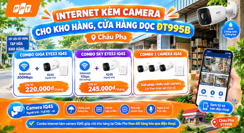Camera IQ4S FPT gắn ở cửa kho hàng ven đường, màn hình điện thoại hiển thị hình ảnh camera, có logo FPT Telecom